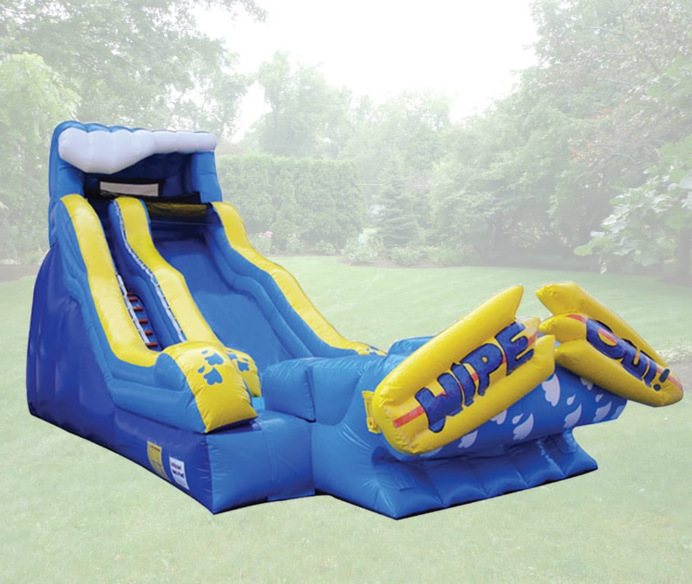 A large inflatable slide with a wipeout theme, featuring bright colors and a steep descent, suitable for outdoor events.