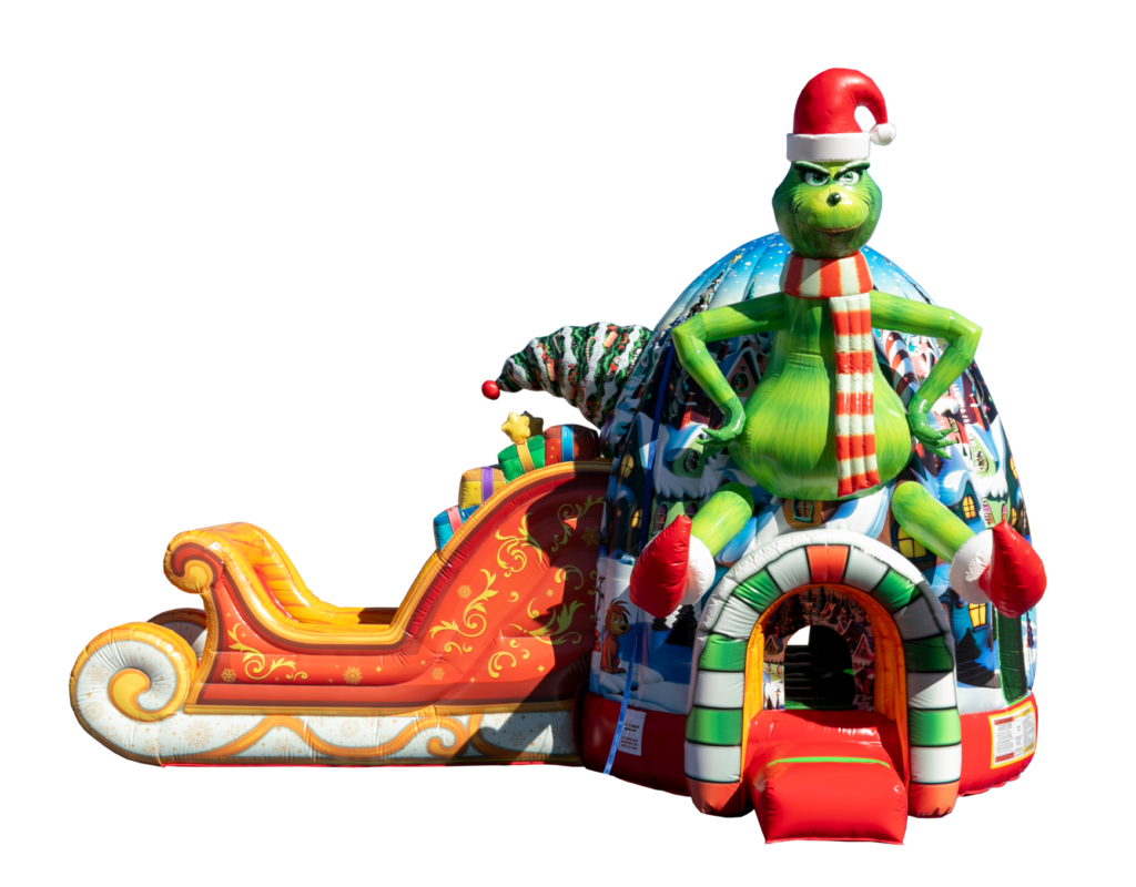 Red and green inflatable combo featuring a sleigh and igloo in a snowy setting, suitable for holiday events.